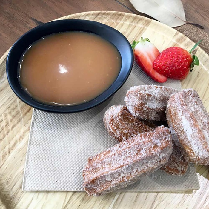 Chocolate churros with chocolate & salted caramel sauce — a Spain dish