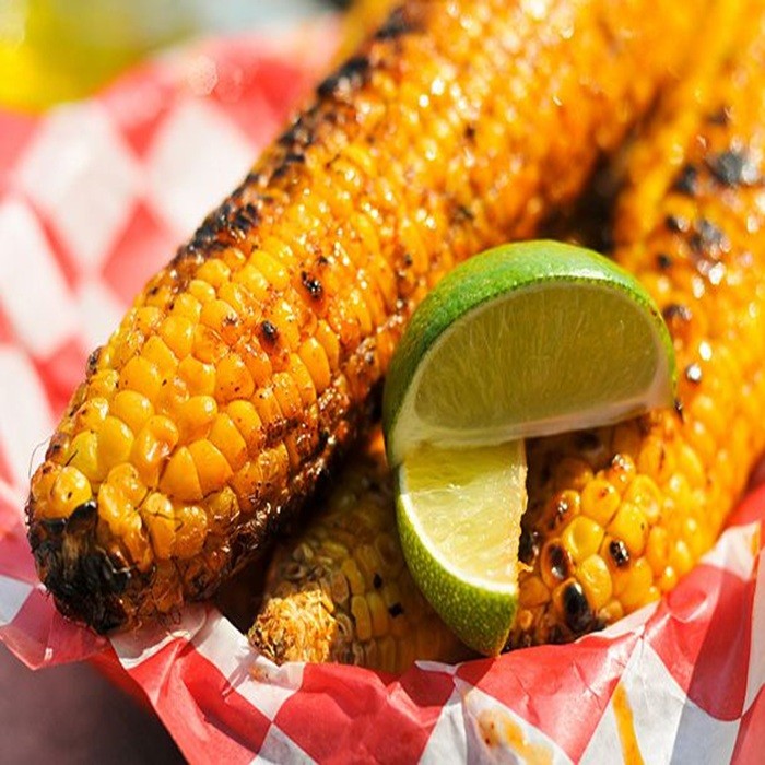 Corn on the cob with lime, green chilli and coconut butter — side